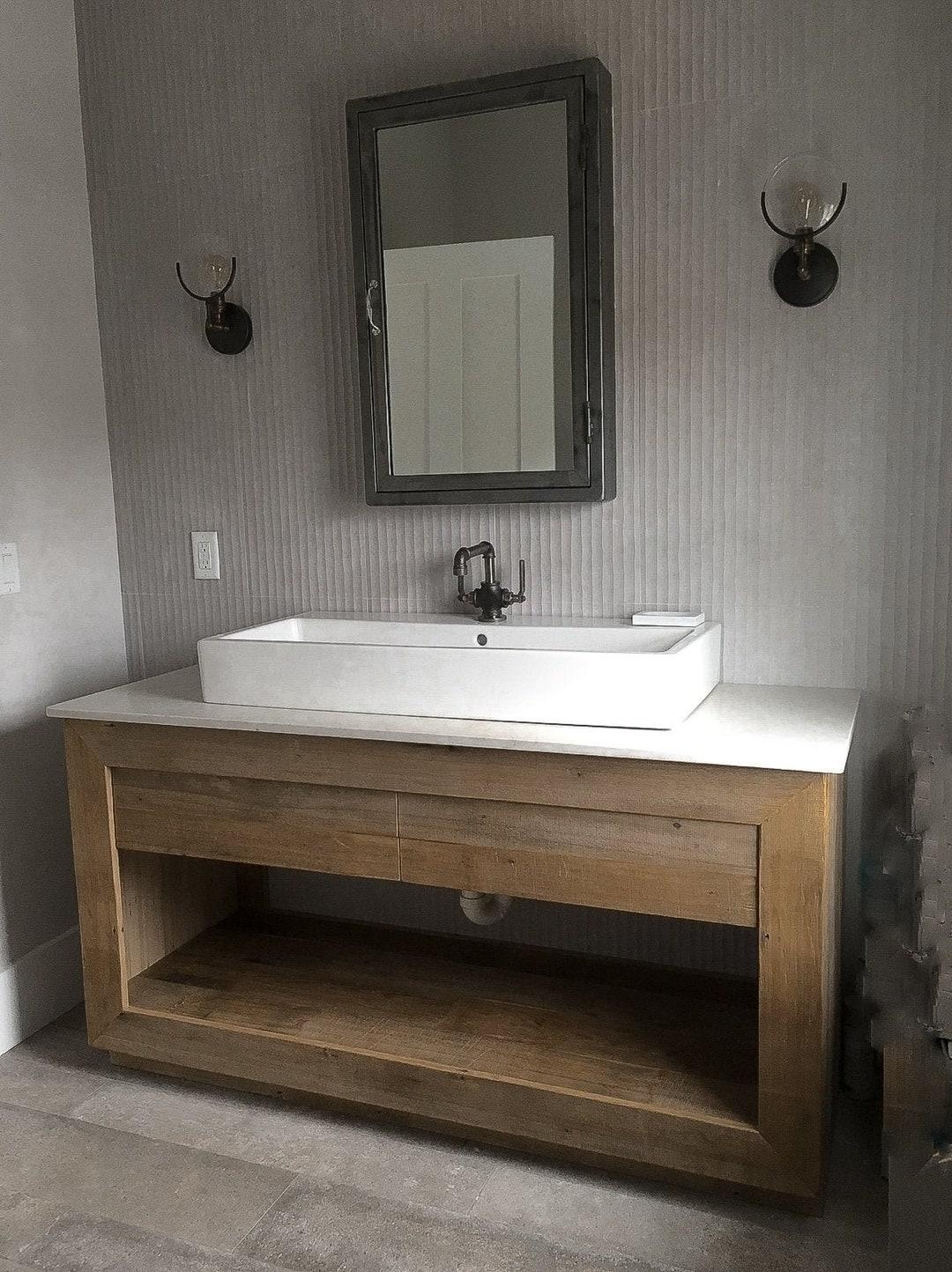 Use reclaimed wood ‌for ​vanities in farmhouse bathrooms