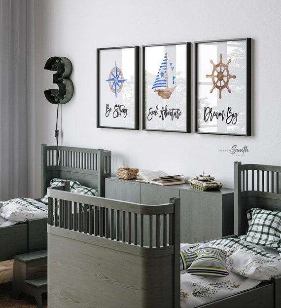 Cozy nautical boy nursery with sailboats and soft shades of blue