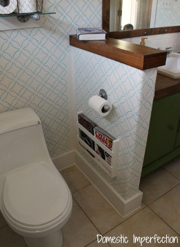 Hang a magazine rack to ​keep reading materials in narrow bathrooms