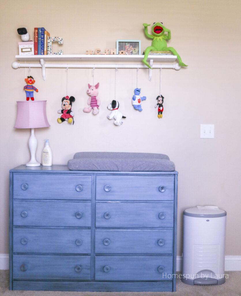 Vintage toy collection displayed creatively‌ in a ⁣charming boy nursery