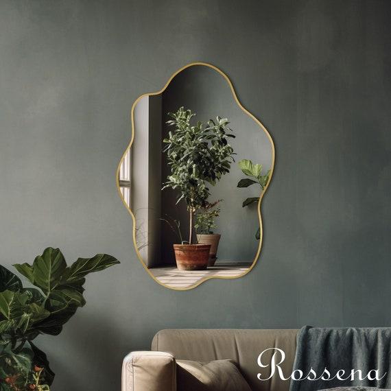 Mix⁣ styles ‍by hanging eclectic mirrors to enhance light‍ in your living room