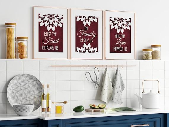 Personalize with artwork that enhances the rich tones of your burgundy kitchen