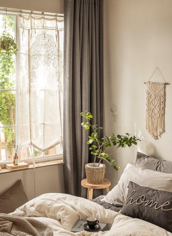 Light, breathable curtains maintain simplicity in your minimalist bedroom