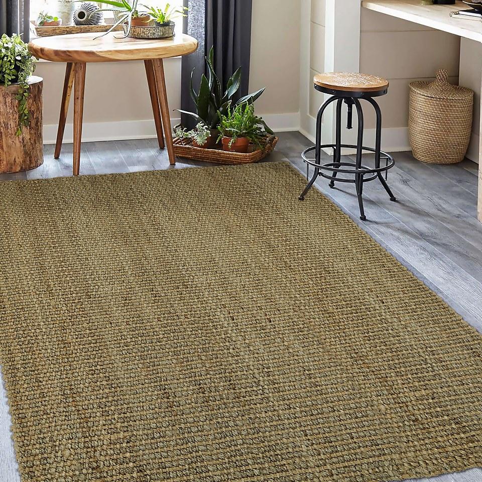 Install natural fiber rugs for texture in your Earthy Living Room space