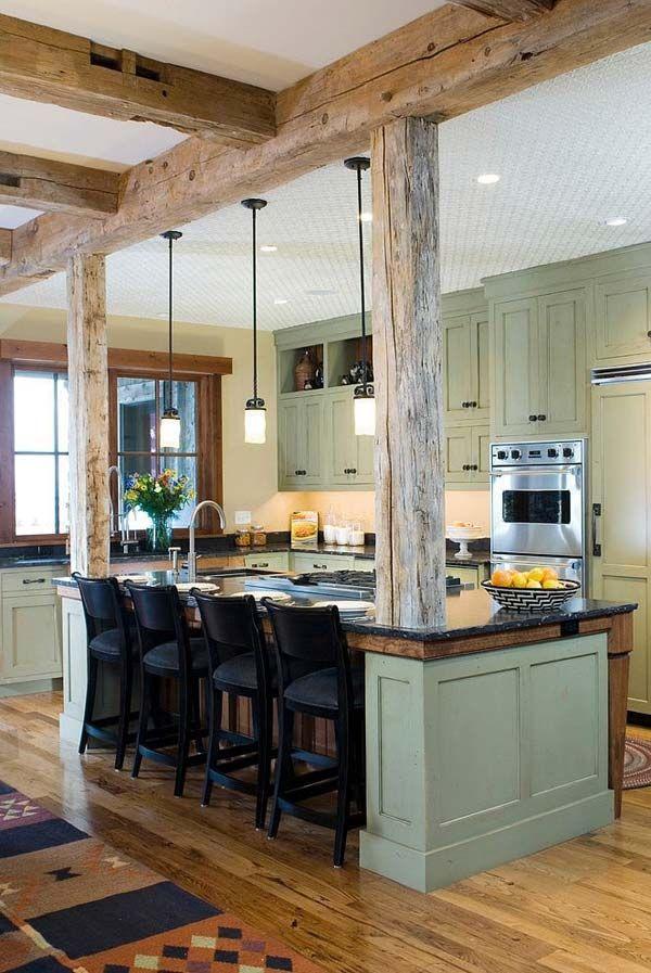 Charming open beams create a spacious feel in your farmhouse kitchen