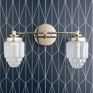 Statement lighting fixtures add flair to any bathroom