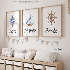 Nautical-themed Boy Nursery featuring anchors and sailboats for a sea-inspired feel