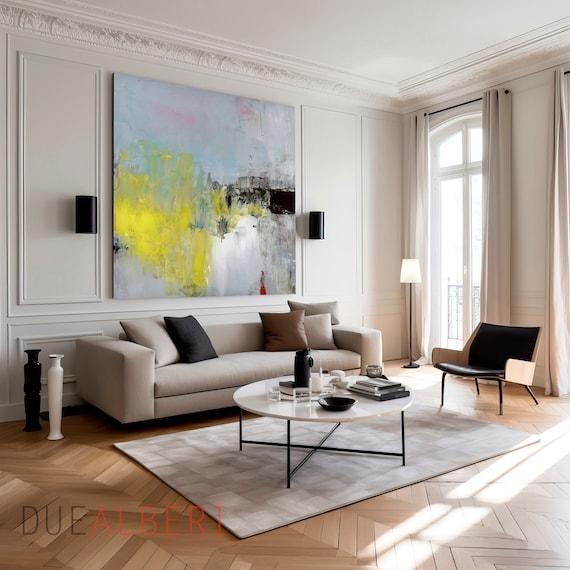 Select an ⁤oversized piece of art ⁣as ⁤a focal point in‍ your eclectic living room