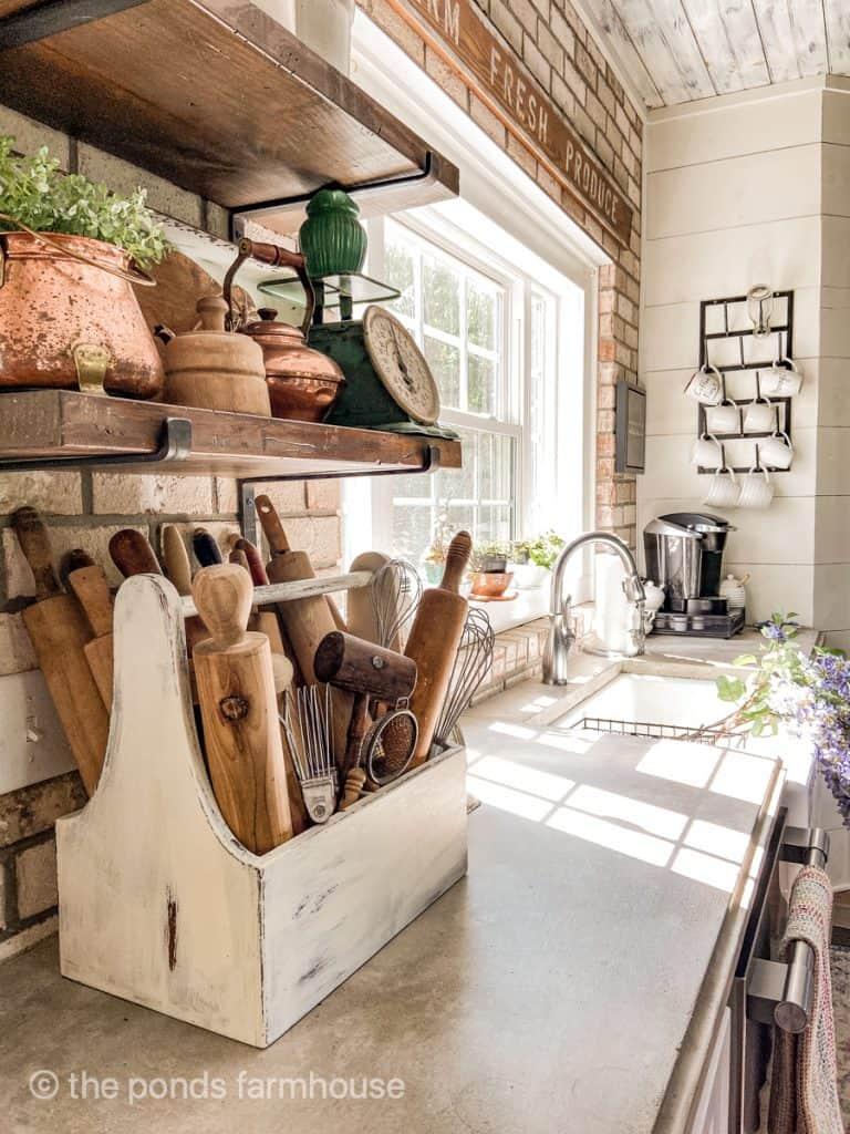 Farm-fresh produce displays invite a touch of nature into your farmhouse kitchen