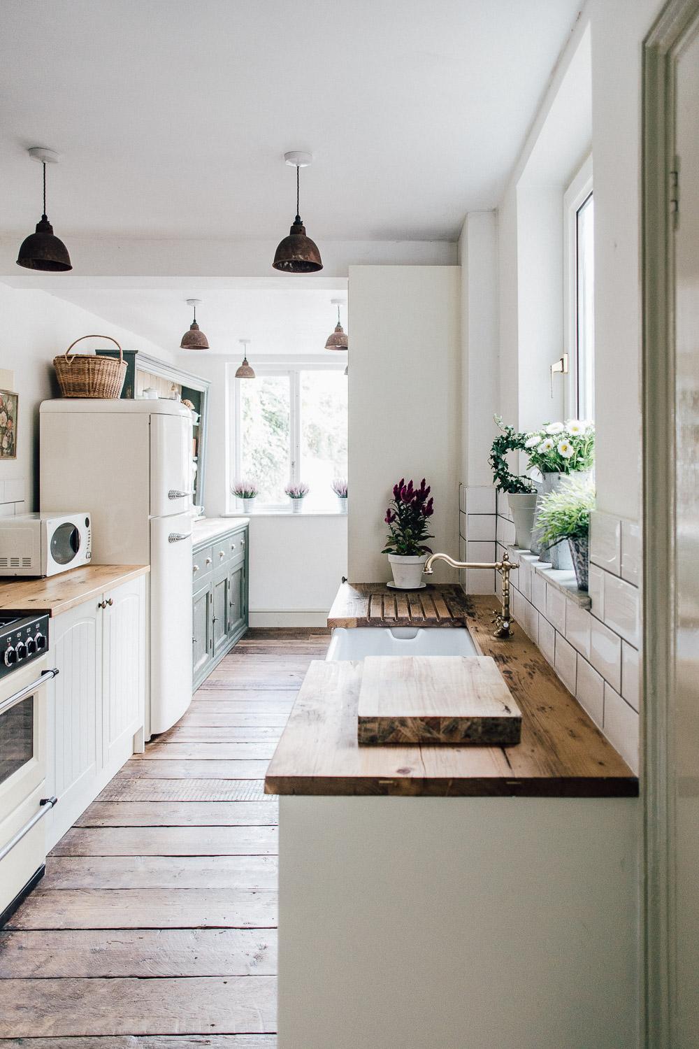 Rustic countertops provide durability and charm in the farmhouse kitchen