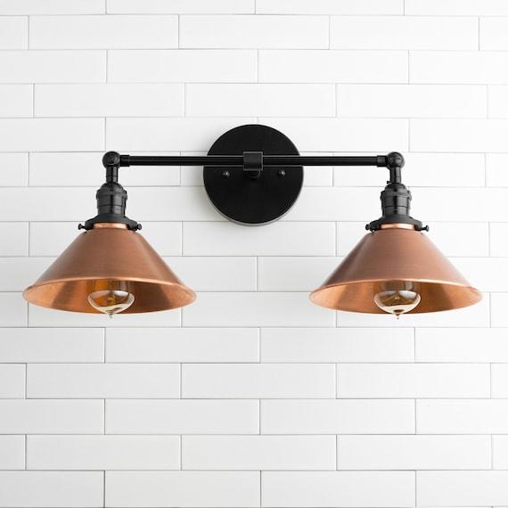 Industrial-style lighting fixtures to enhance an eclectic bathroom ambiance