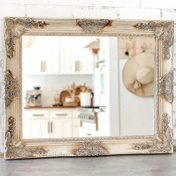 Antique-style mirrors to enhance lighting and character in farmhouse bathrooms