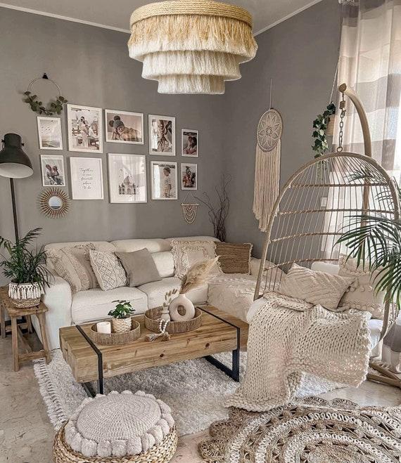 Experiment with artistic lighting fixtures to enhance visual interest in your Boho living room