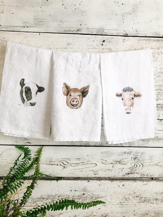 Charming printed tea towels add character to your farmhouse kitchen decor