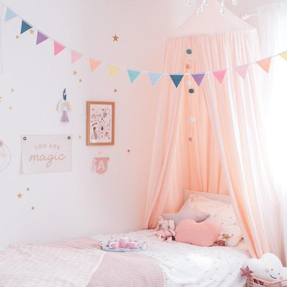 Use multicolored bunting to bring a festive vibe to your boy nursery