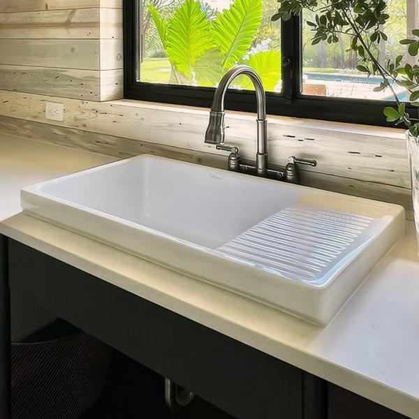 A farmhouse sink, perfect for practicality and charm in your farmhouse kitchen