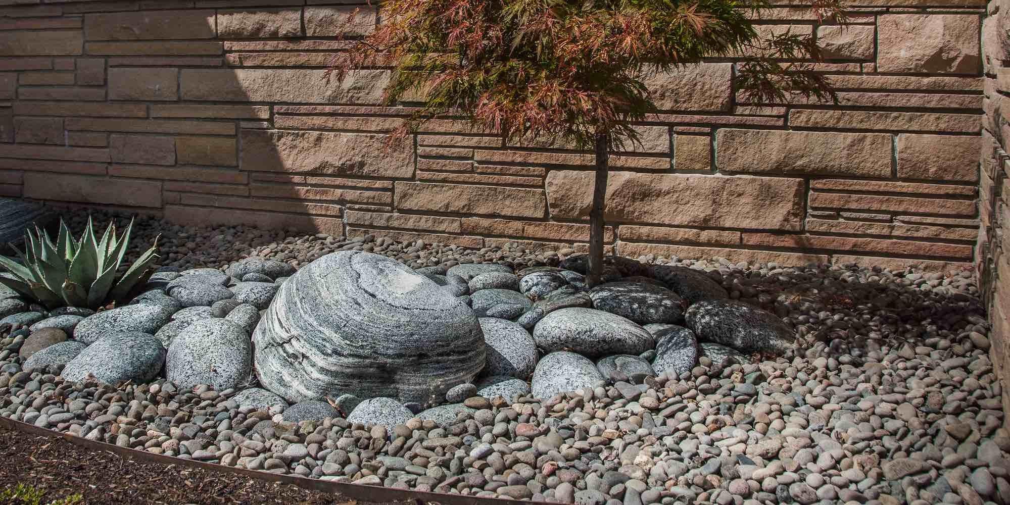 Create⁣ a unique rock garden for a low-maintenance option in front yard landscaping