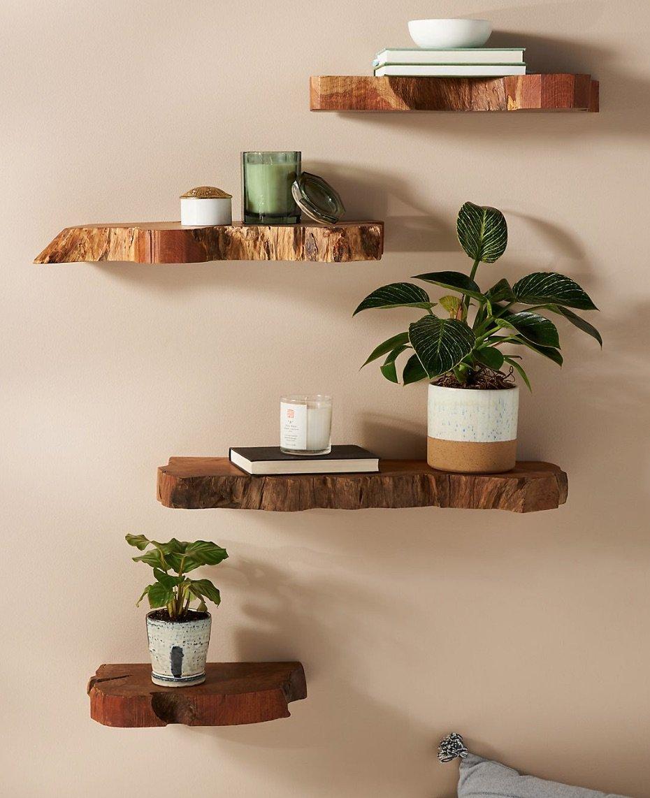 Install floating shelves to display ‌natural decor in your earthy living room