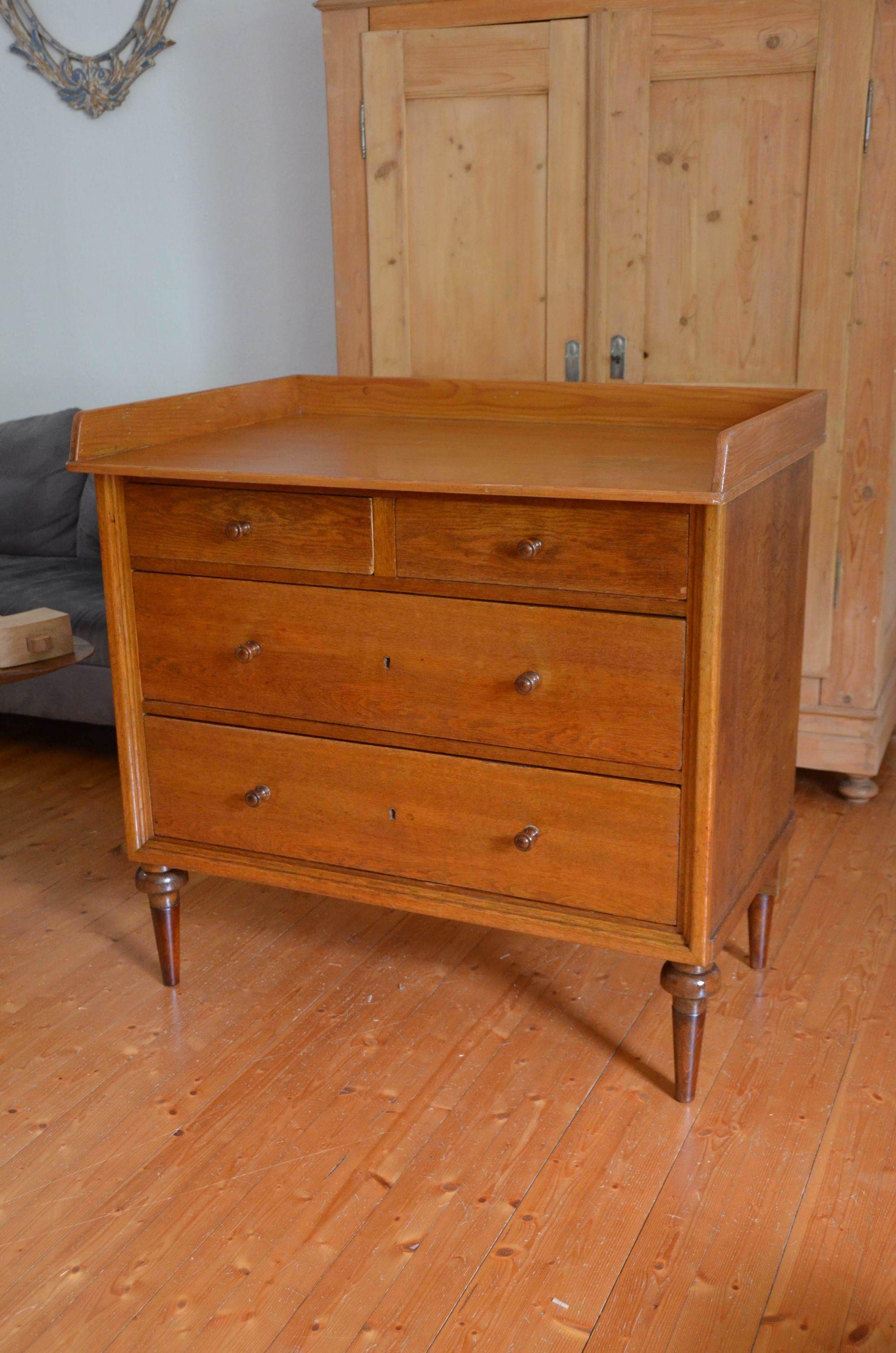 Antique dresser transformed ‍into a changing table in⁢ your ⁣nursery nook