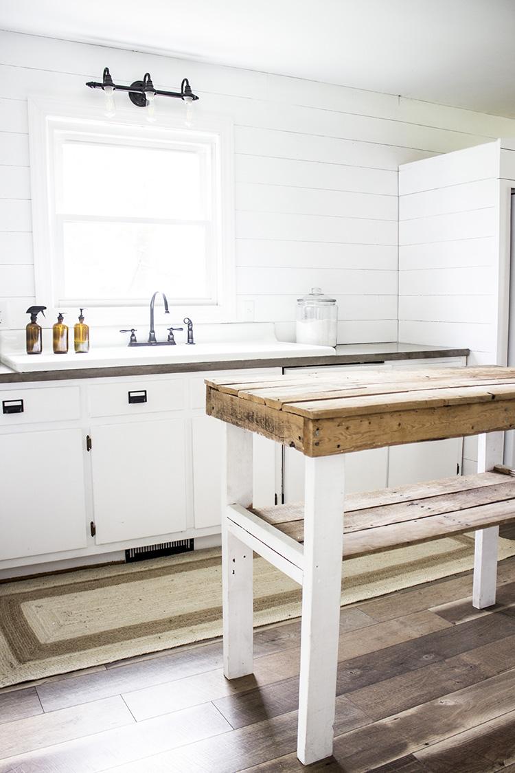 Choose vintage or reclaimed wood for table and countertop surfaces in your Farmhouse Kitchen