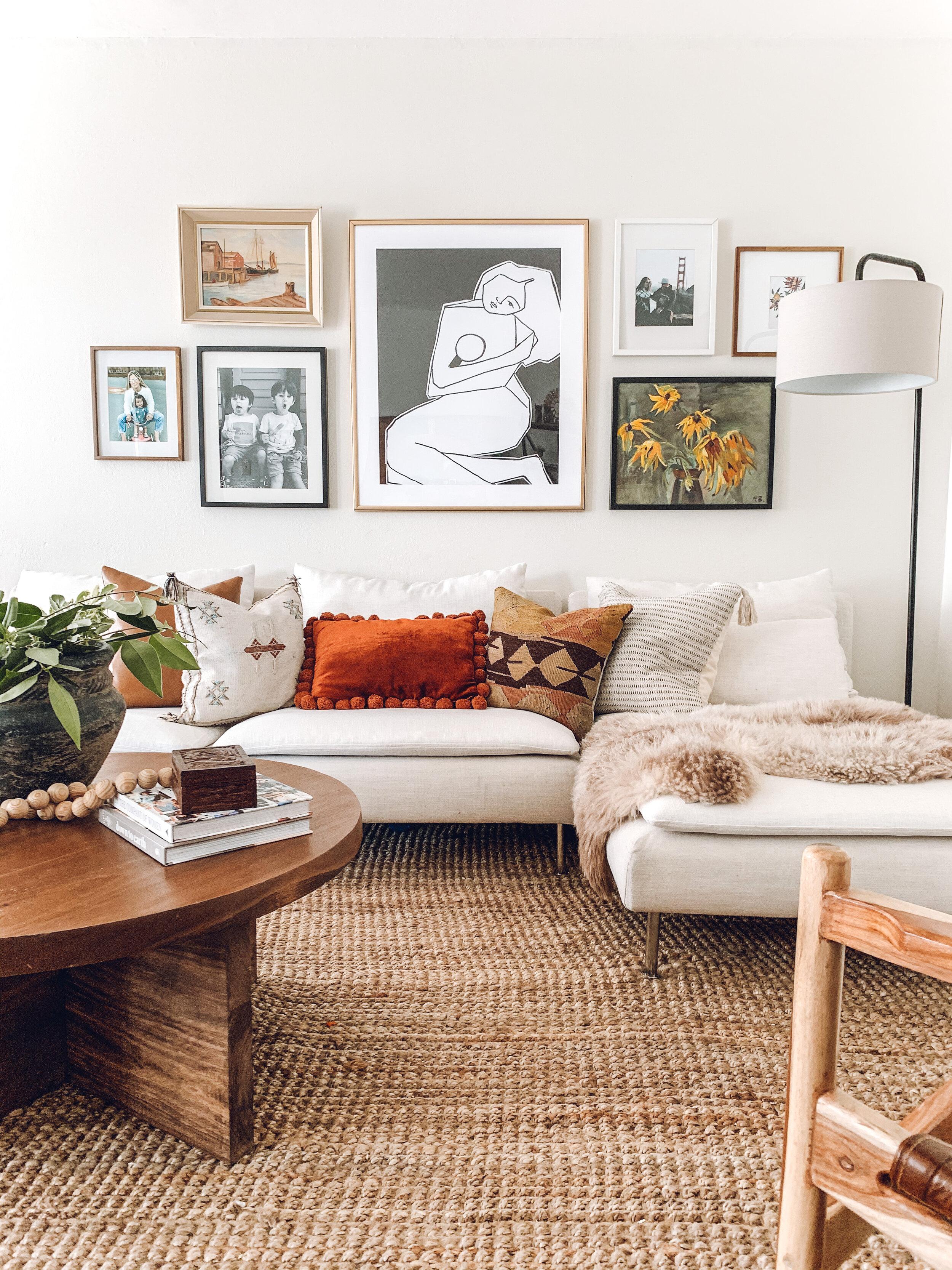 Create a gallery wall featuring family photos in your Boho Living Room