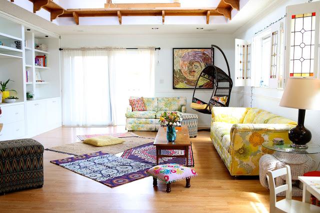 Layer rugs to add texture and warmth in your​ Boho Living Room