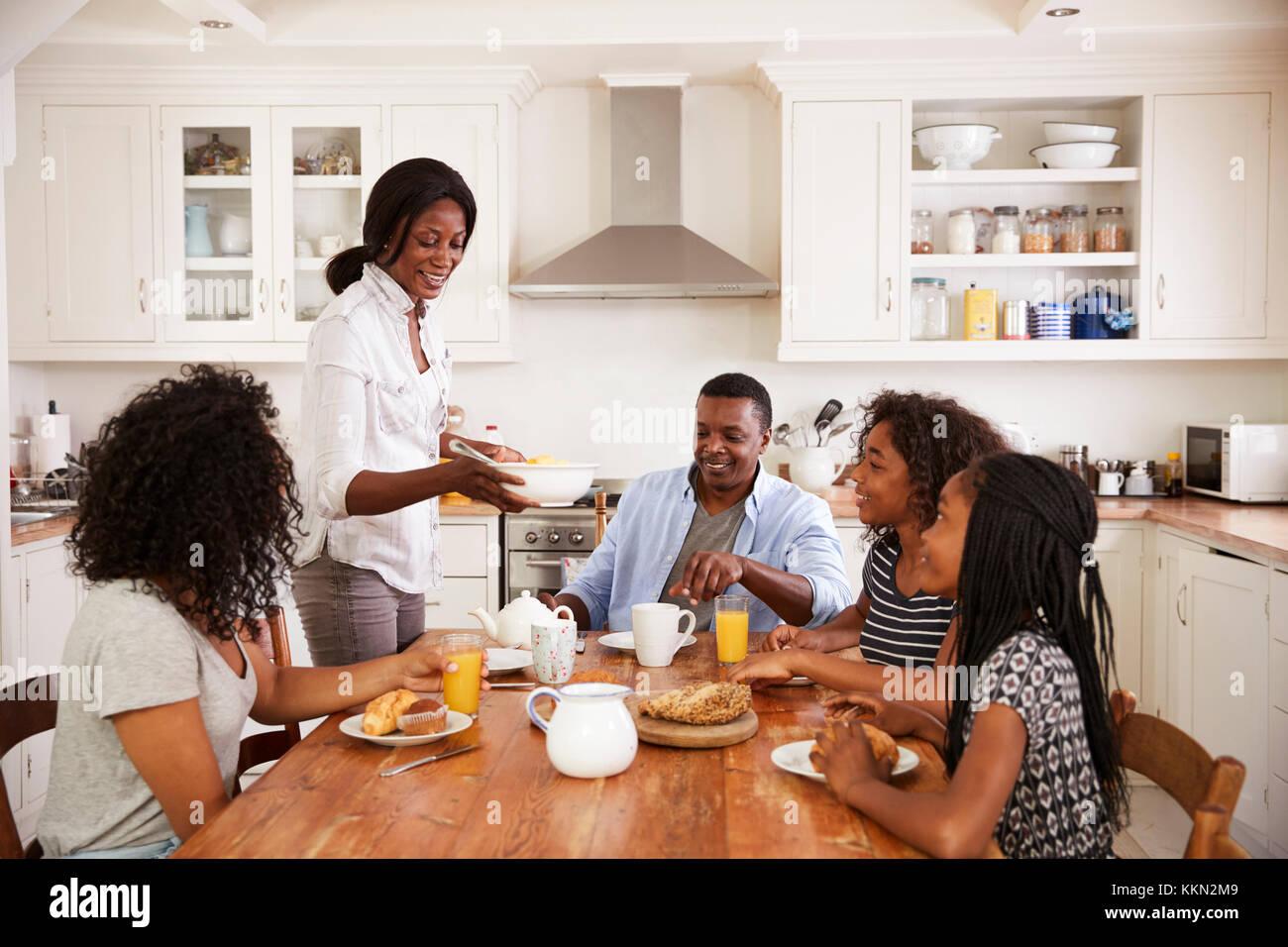 Personal touches, like family photos,‌ personalize your eat-in kitchen