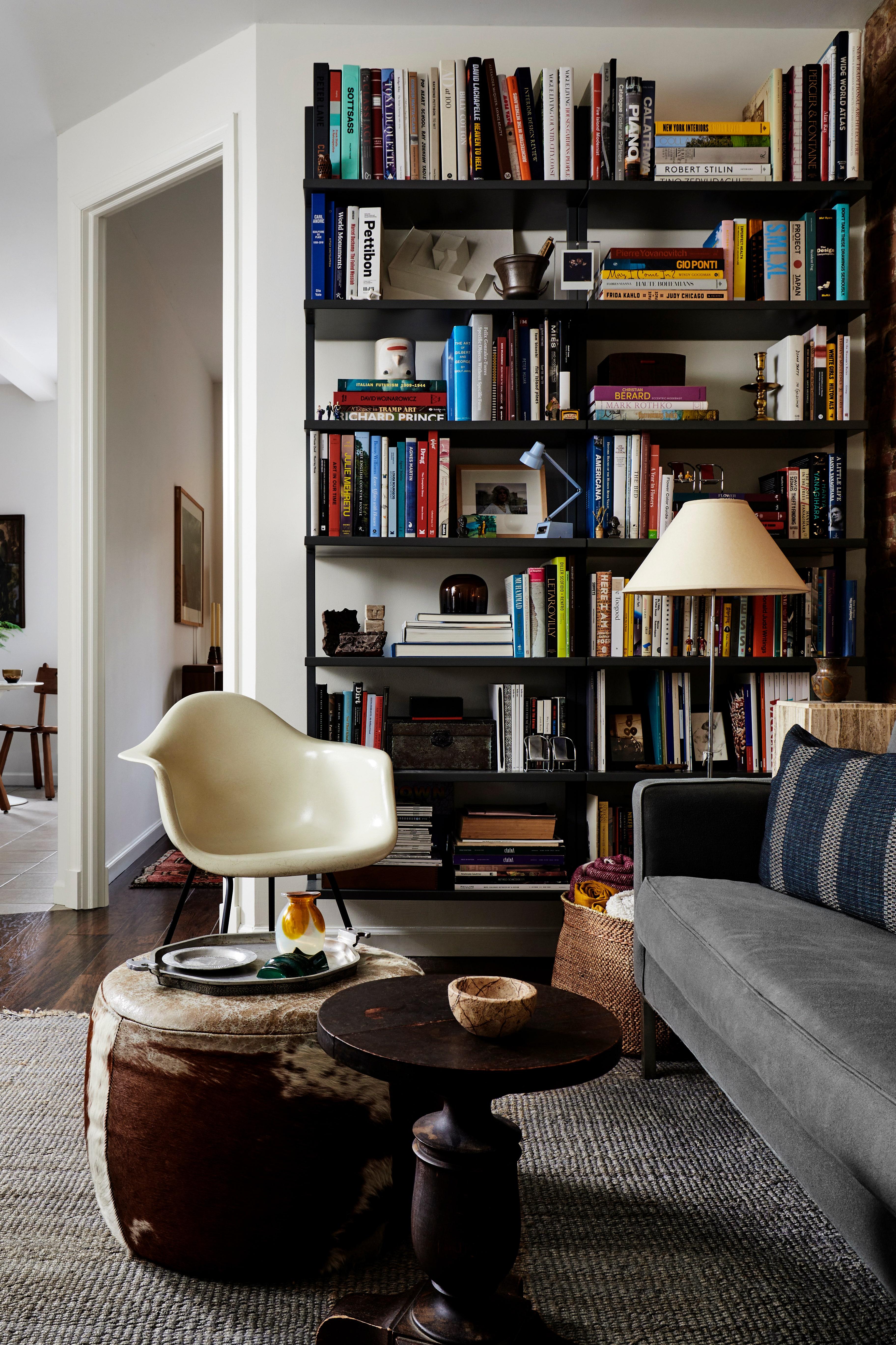 Opt for chic shelving ​to showcase your favorite books and decor in style