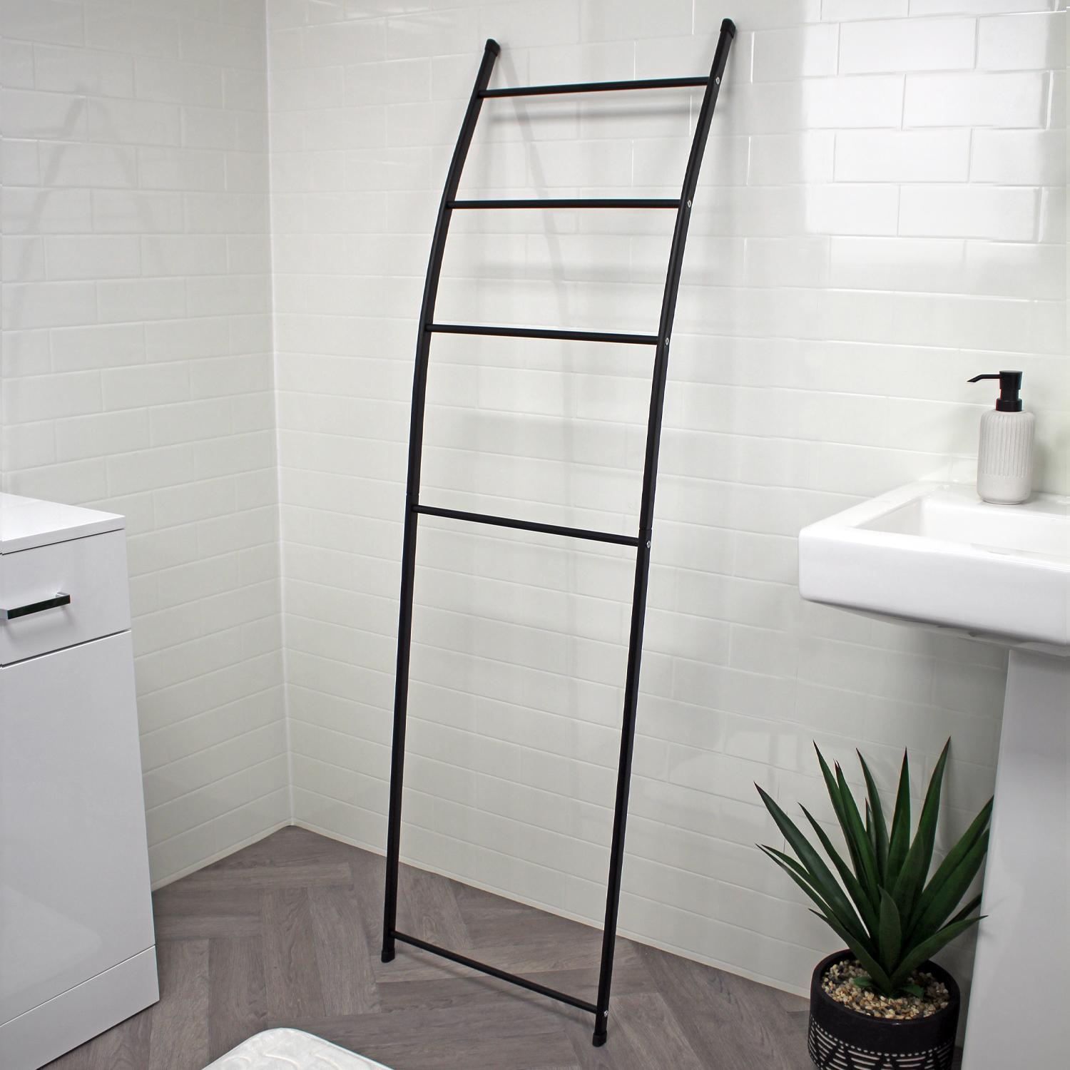 Create a ‍ladder towel⁢ rack for ⁣functional eclectic bathroom flair