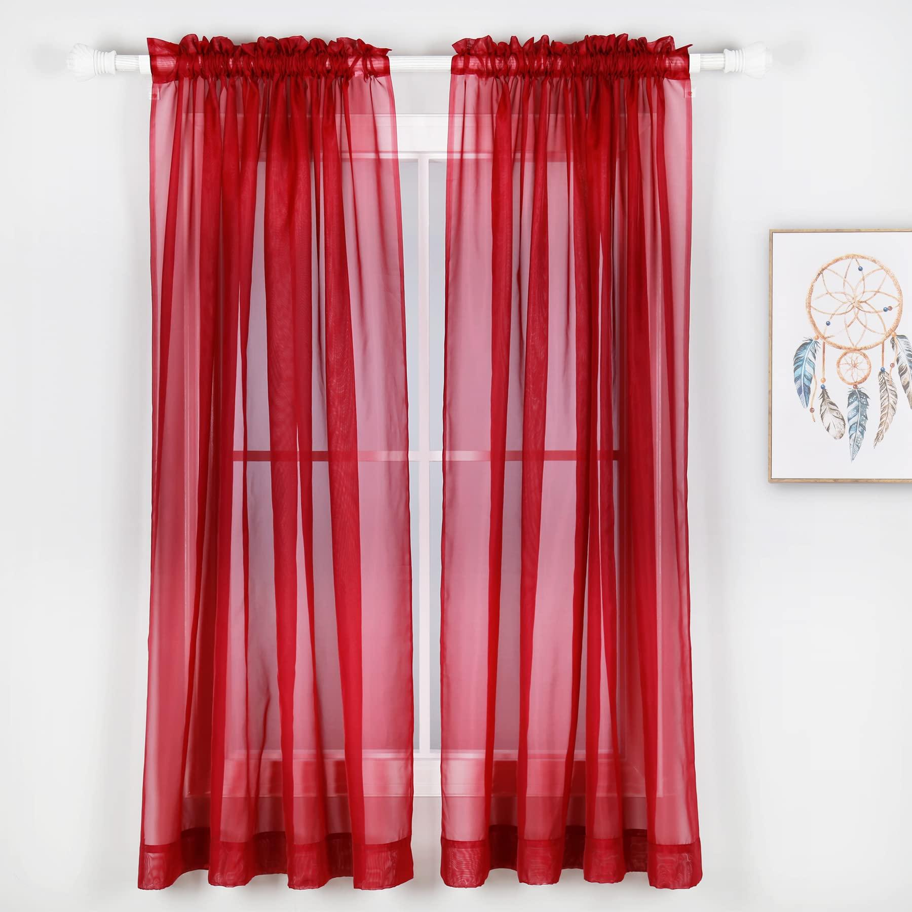 Embrace natural light with sheer ​curtains in your Burgundy Kitchen windows