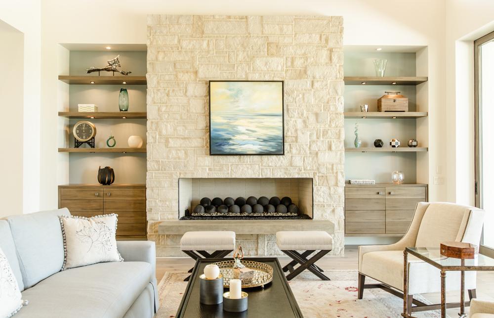 Create a focal point with a stone fireplace in your earthy living room