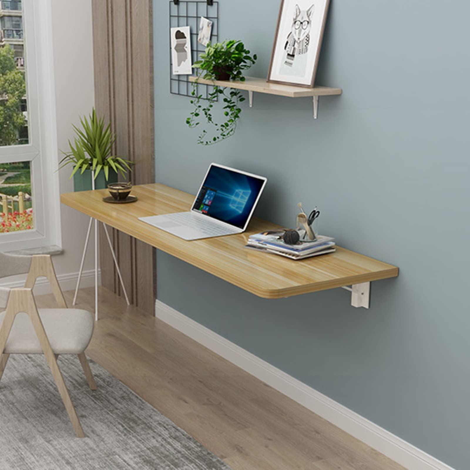 Incorporate a wall-mounted desk for a stylish small bedroom workspace