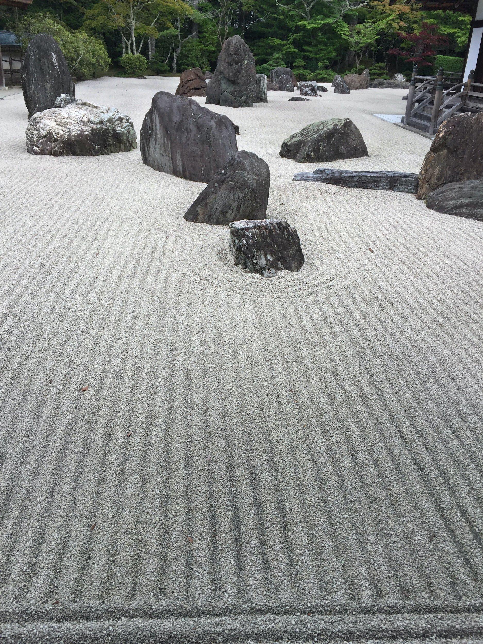 Use gravel or sand to create raked ​patterns in your Zen Garden