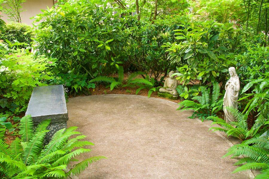 Arrange a comfortable seating area for mindfulness meditation in your Zen Garden