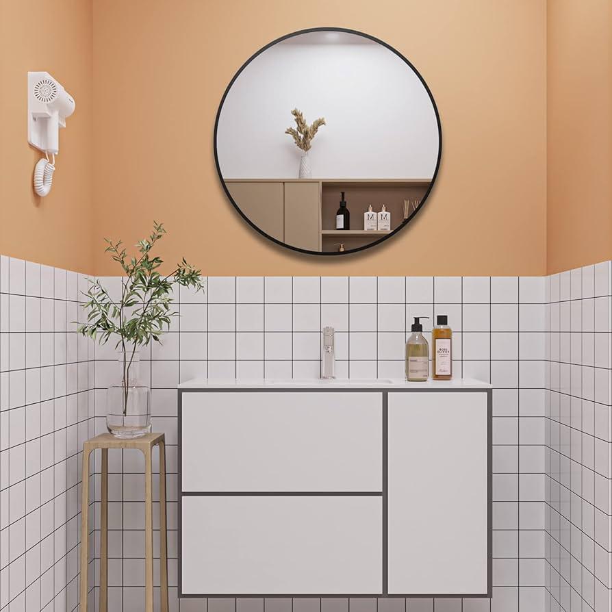 Choose a round mirror to soften angles in your narrow bathroom