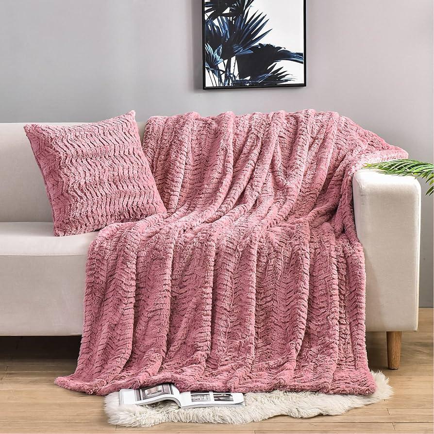 A plush blanket makes your teen girl bedroom extra cozy and inviting