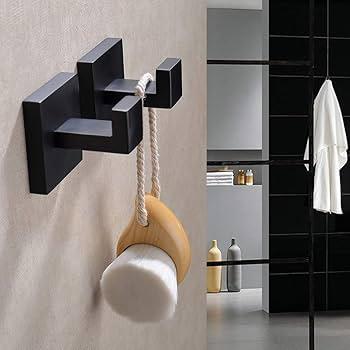 Use wall-mounted hooks for towels, freeing up valuable small bathroom space