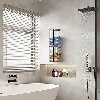 Use‍ a wall-mounted towel rack to save floor space in narrow bathrooms