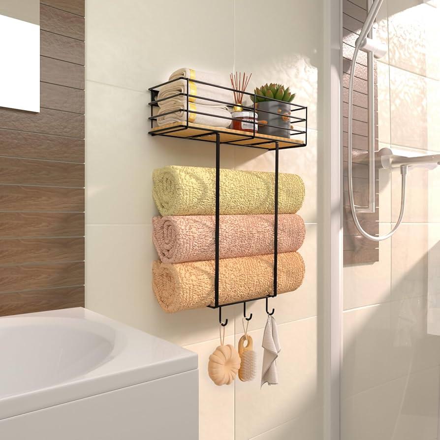 Hang towels on decorative ⁤hooks to ⁣save space in⁤ a‍ small bathroom