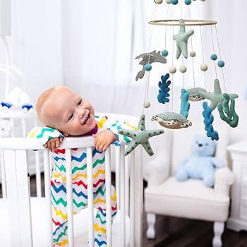 Hang a mobile to capture attention ‍in your Nursery Nook