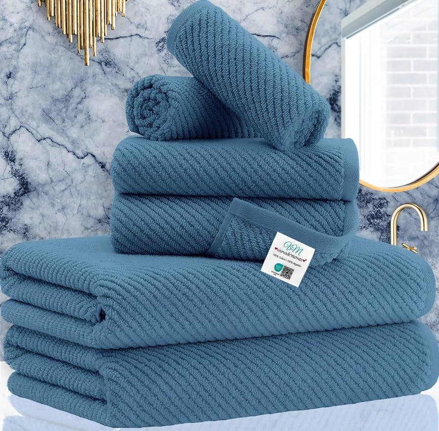 Textured ⁣cotton towels⁢ offer comfort in farmhouse ⁣bathrooms