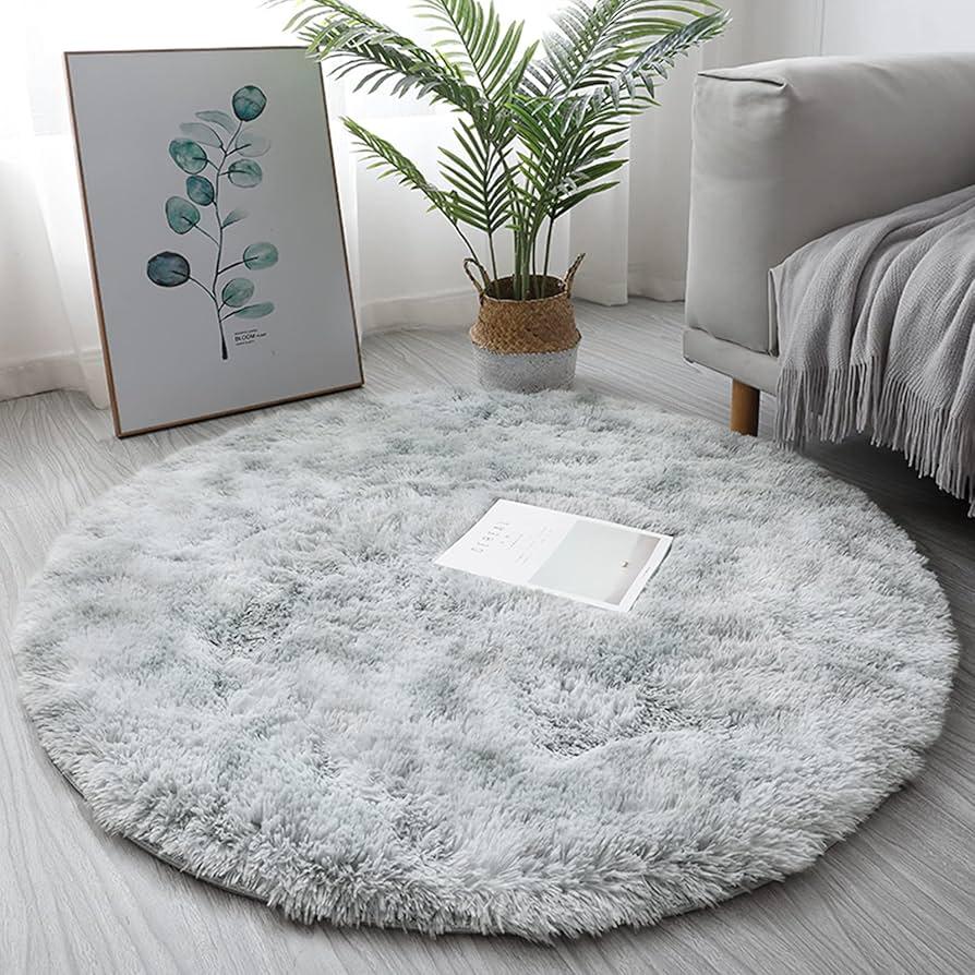 Soft ⁣area rug to ⁢create a warm atmosphere in ‌your⁢ Nursery Nook