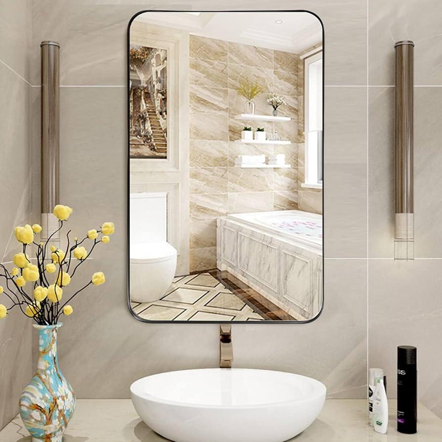 Hang‍ a large‍ mirror to⁣ visually enlarge your small bathroom