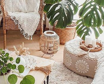 Incorporate a pouf for extra seating and playful decor in your Boho Living Room