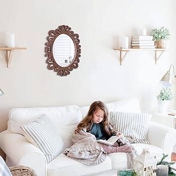 Hang vintage mirrors to create the illusion of space in your Boho Living Room