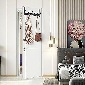 Add hooks or racks behind the door‌ of your narrow bathroom