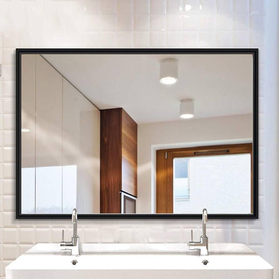 Hang an oversized mirror to create depth in your eclectic bathroom