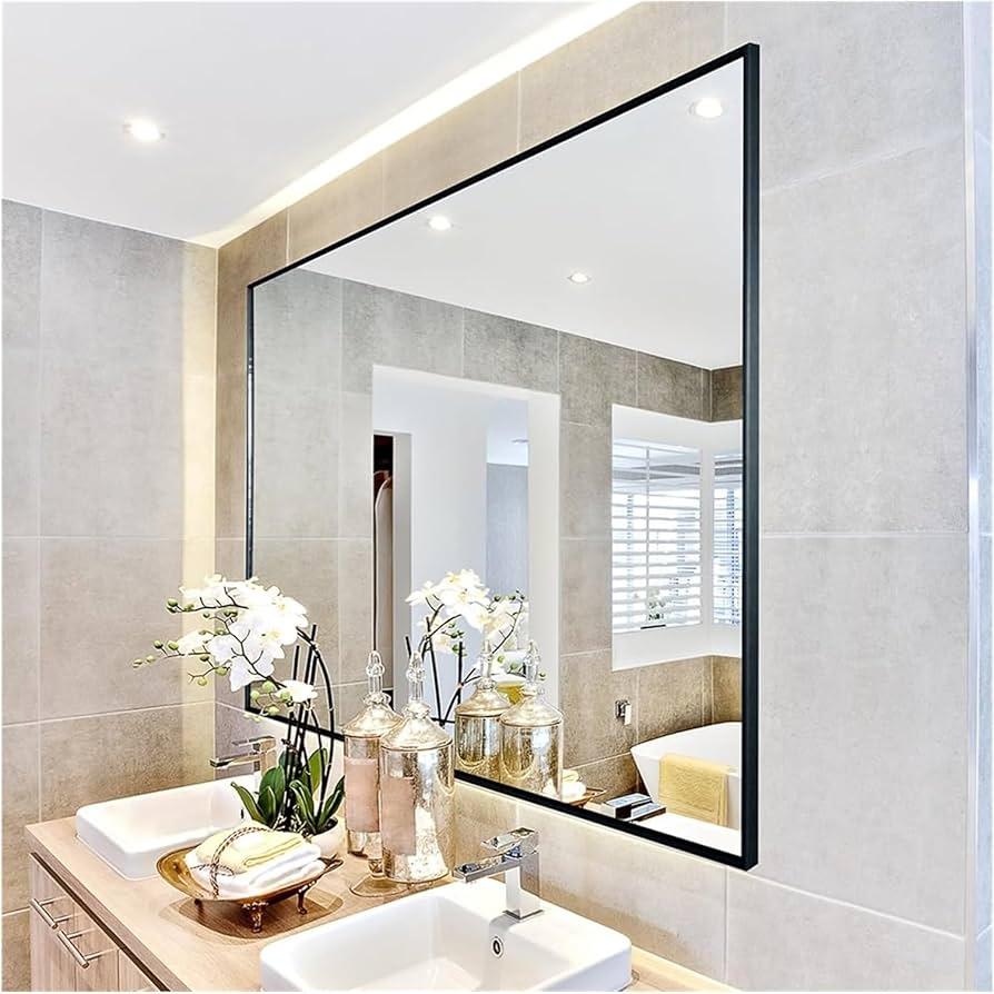 Large mirrors make bathrooms feel more‌ spacious and reflective