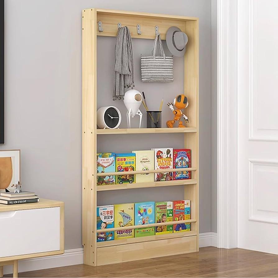 Functional shelving showcases toys and books⁣ in your nursery nook