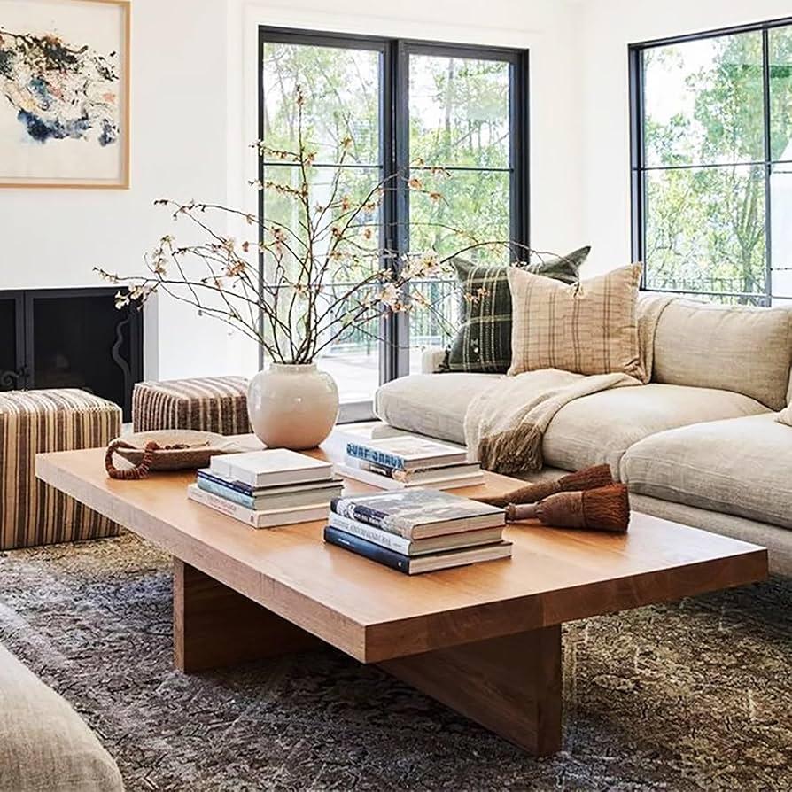 Choose ‍an oversized coffee table made of natural wood for ⁤your‌ earthy living room